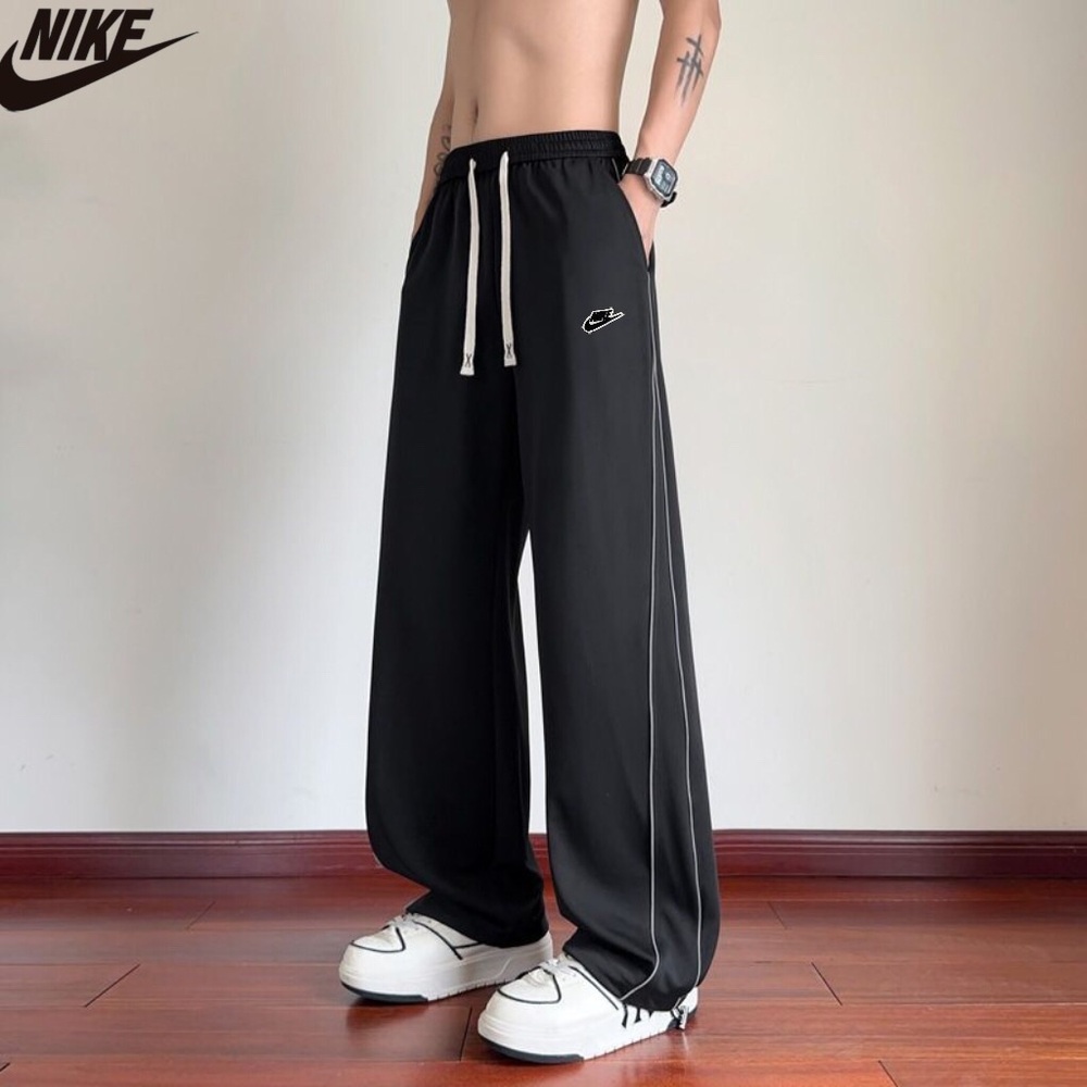 Nike Men's Black Joggers with White Accents